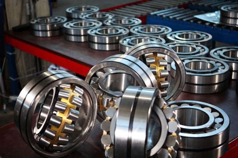 Replacement bearings staged for a decanter centrifuge rebuild